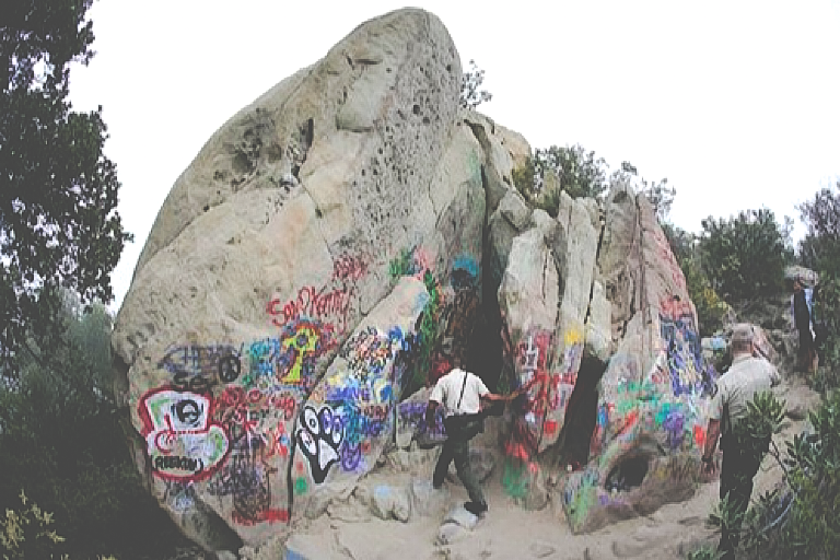 Corral Canyon Cave, better known by the misleading moniker "Jim Morrison Cave," was was closed to the public until further notice. Large crowds have shown up on a daily basis to see the often vandalized cave and add to the vandalism with graffiti of their own.
