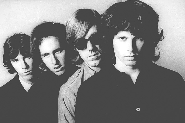 ADV. FOR WKD. EDS, NOV. 28-30–FILE–Members of the Doors pose for an undated publicity photo. From left; John Densmore, Robbie Krieger, Ray Manzarek and Jim Morrison. Morrison died in 1971 at age 27. A four-CD boxed set of Doors material has been released, breaking sales records for boxed sets this year in its first week of release, according to Electra Records. (AP Photo/file)