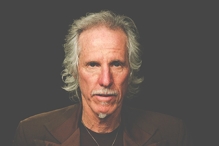 This April 17, 2013 photo shows fFormer Doors drummer John Densmore in New York. The 68-year drummer is no stranger to chronicling his former band. He wrote The New York Times best-seller, “Riders on the Storm” in 1991. He keeps the spirit of Jim Morrison alive in his latest book, "The Doors Unhinged: Jim Morrison's Legacy Goes on Trial." (AP Photo/John Carucci)